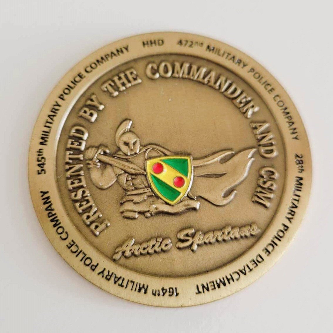 Military Police coin featuring a spartan warrior design